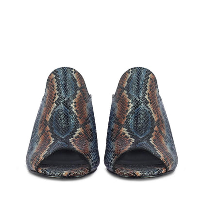 Saint Fiona Snake Print Leather Block Heels: Handcrafted elegance with a touch of wild charm. Elevate your style effortlessly.