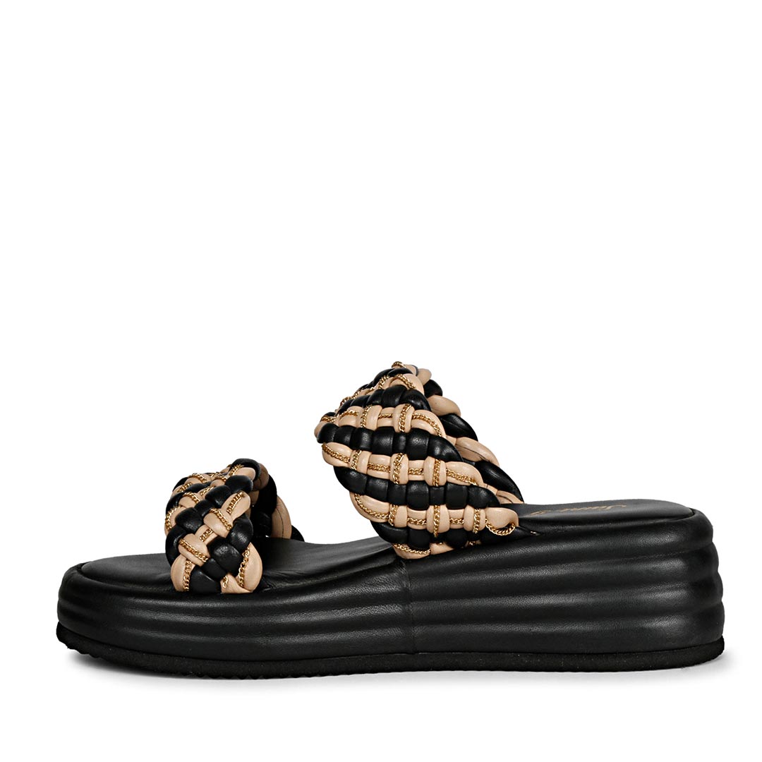 Elevate your outfit with SAINT FLURINA Black Platform Sandals - Woven leather and chain embellishments for a touch of glamour.