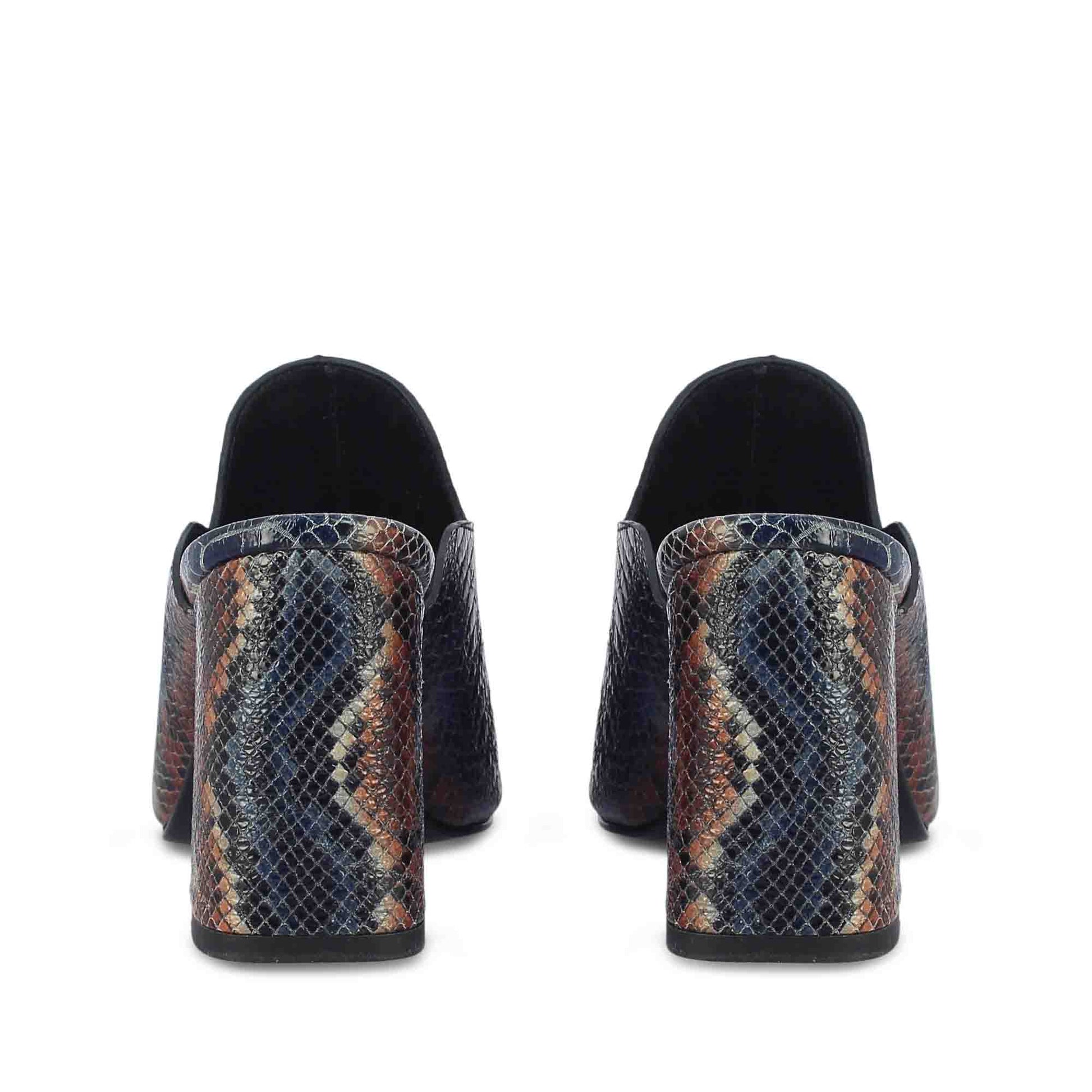 Saint Fiona Snake Print Leather Block Heels: Handcrafted elegance with a touch of wild charm. Elevate your style effortlessly.