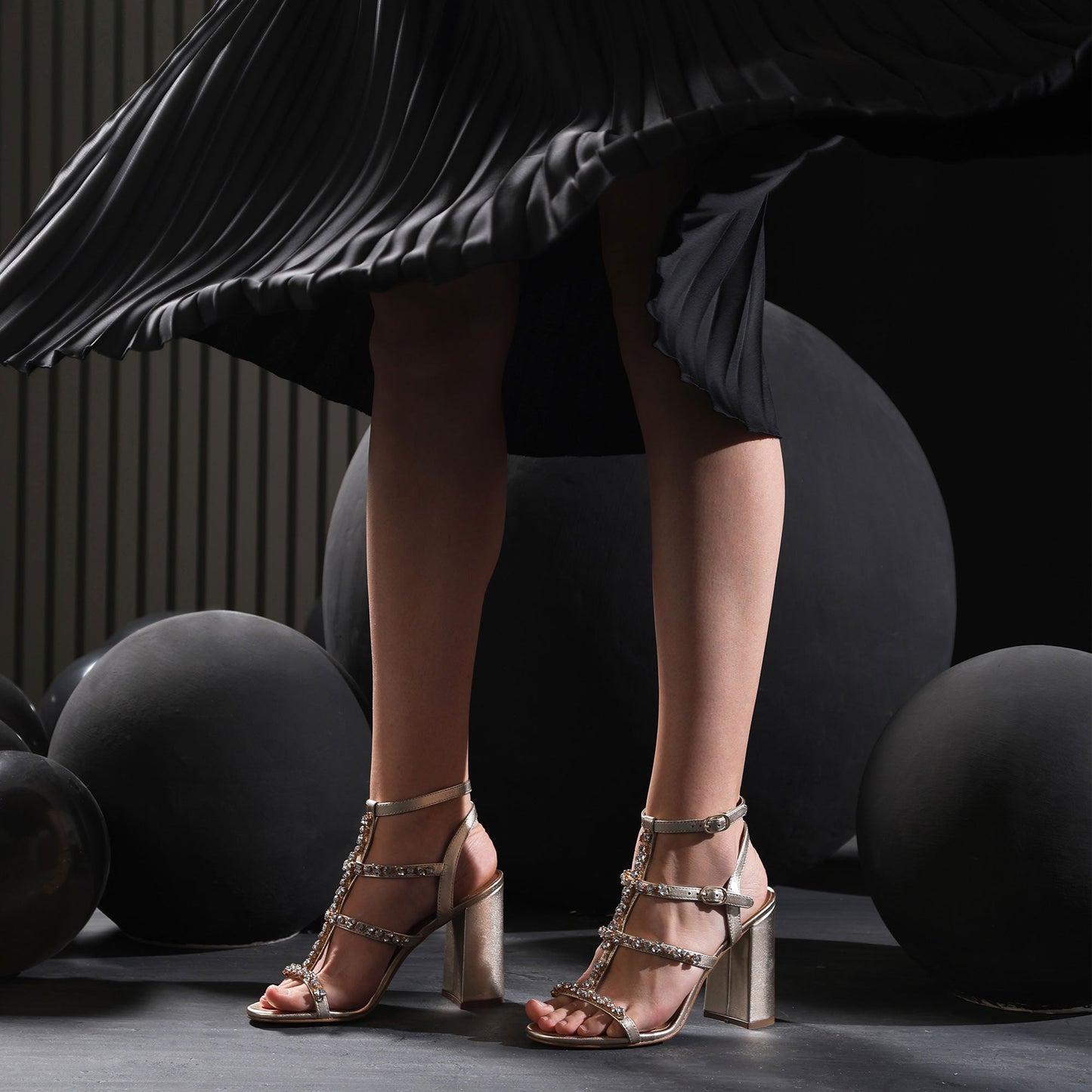 Elegant metallic heels with stone details