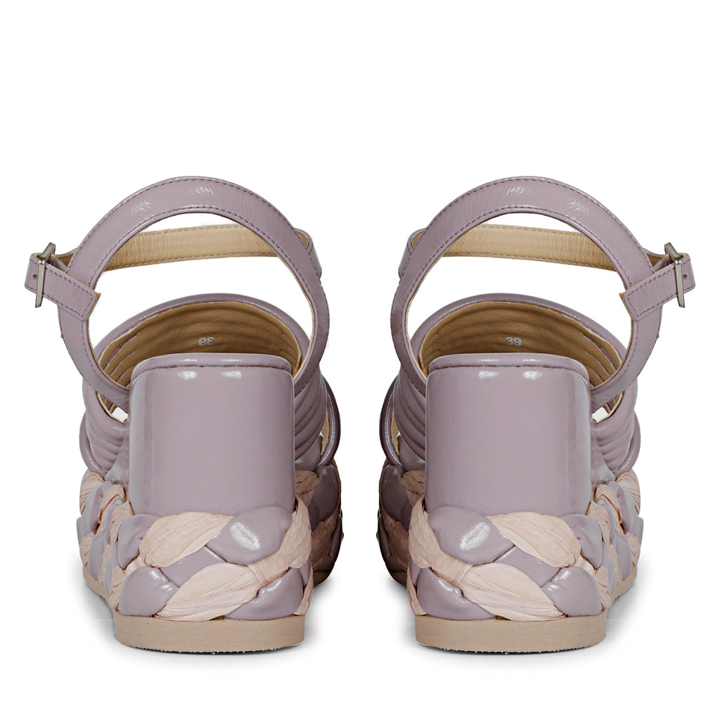Step out in fashion with lilac leather platform sandals."
