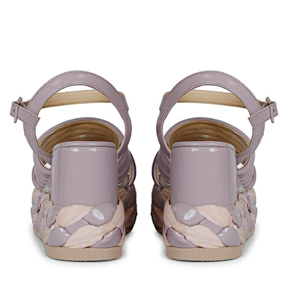 Step out in fashion with lilac leather platform sandals."