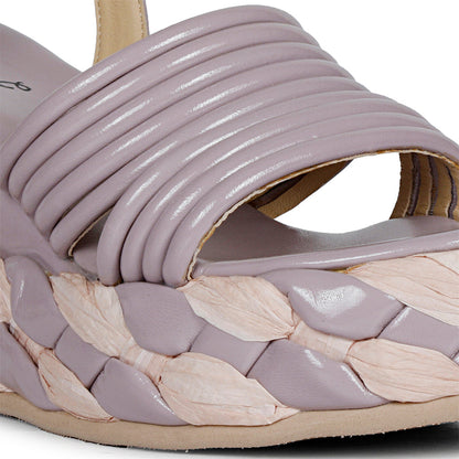 Step out in fashion with lilac leather platform sandals."