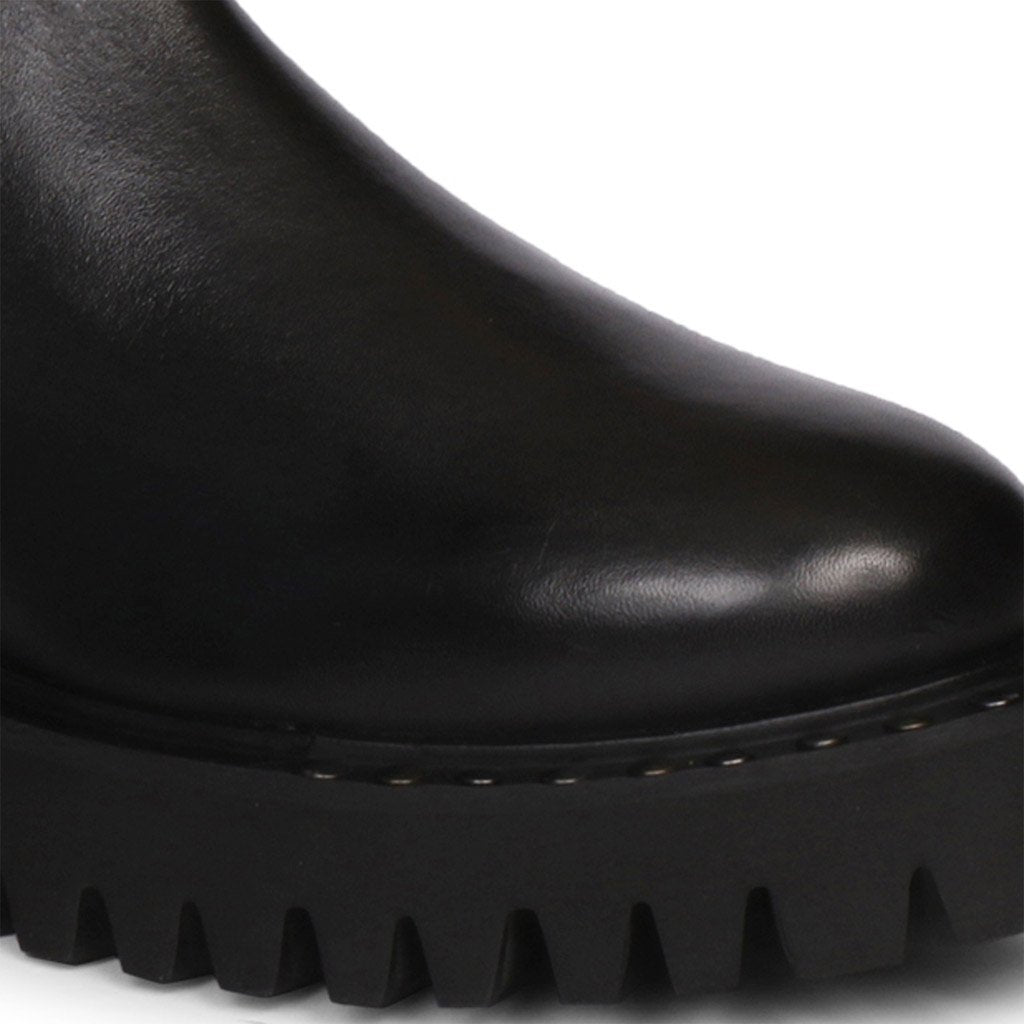 Saint Jessica Metal Studded High Ankle Leather Boots - Edgy and stylish high ankle boots with metal studs for a bold fashion statement