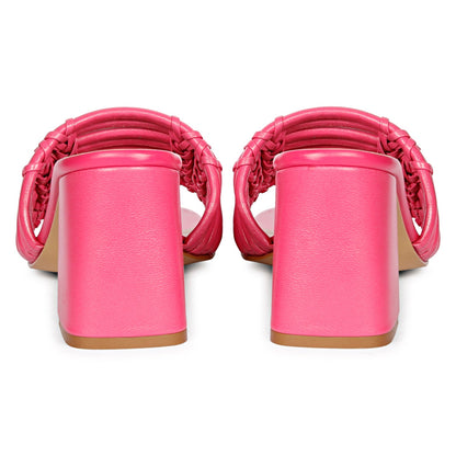 Strappy hot pink heels by Saint Bethany - elevate your style with these leather block heels