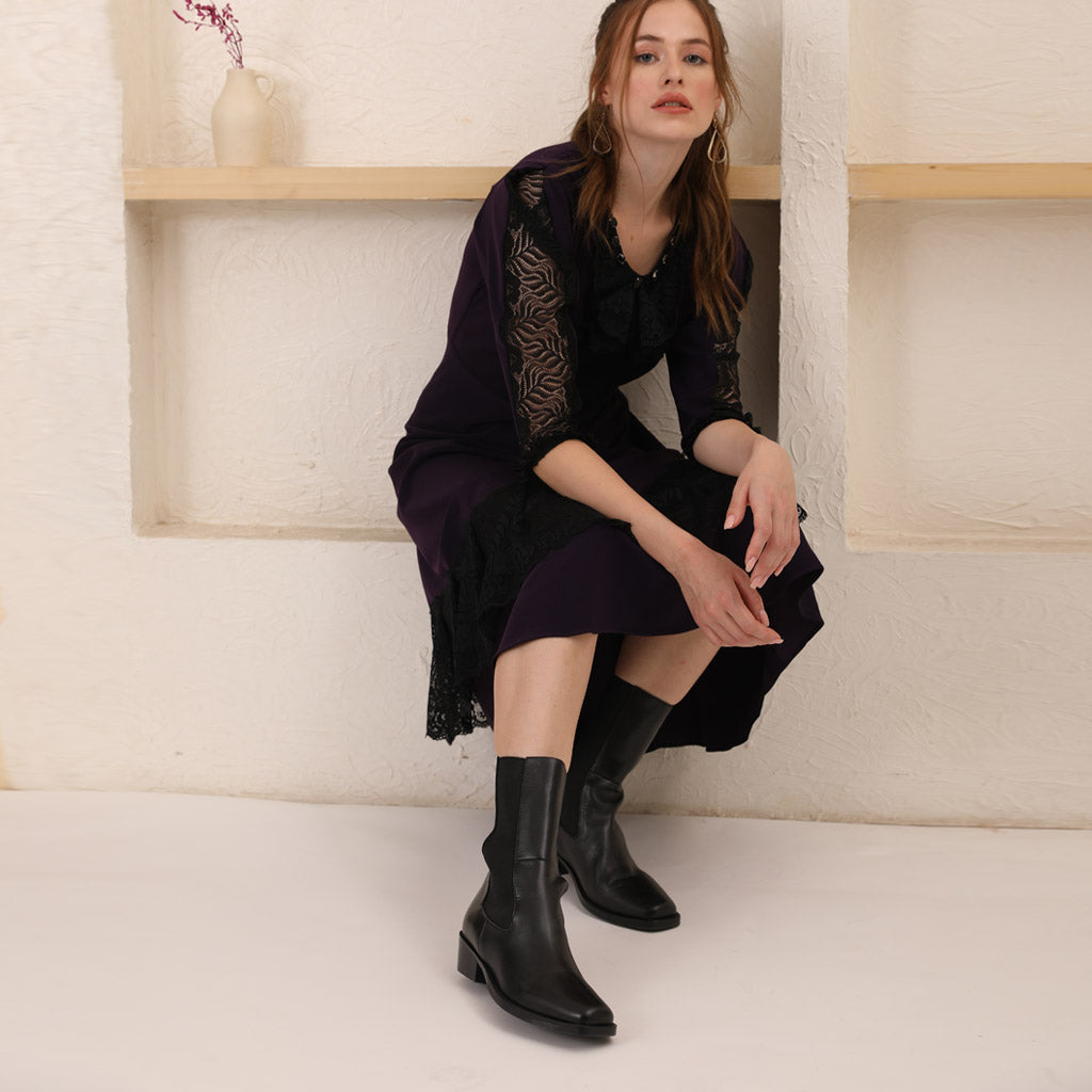Saint Theresa High Ankle Black Leather Boots with Decorative Buckle – Stylish and chic footwear for a bold and confident look