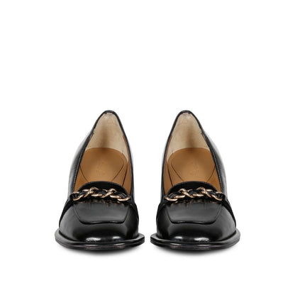 Step into luxury: Saint Mirielle's black patent leather moccasins - handcrafted perfection