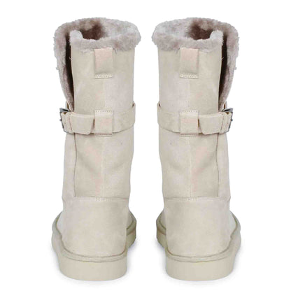 Chic ivory suede boots with decorative buckle, crafted by Saint Aurelia for snug comfort and style